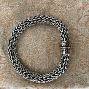 Bali Style Sterling Silver Bracelet with gold detail on clasp.